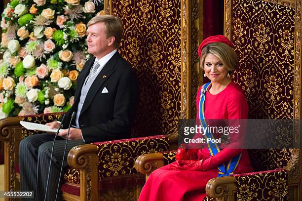King Willem-Alexander, with Queen Maxima of the Netherlands, delivers an address to the government on budget day in the Hall of Knights, on September...