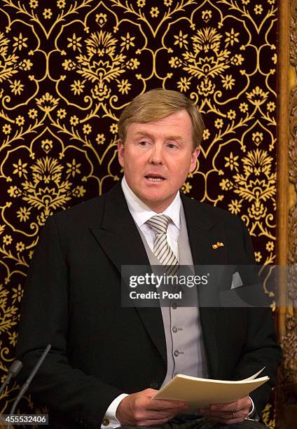 King Willem-Alexander of the Netherlands delivers an address to the government on budget day in the Hall of Knights, on September 16, 2014 in The...