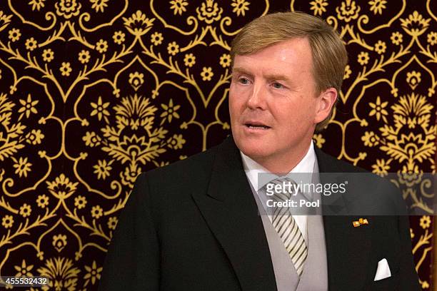 King Willem-Alexander of the Netherlands delivers an address to the government on budget day in the Hall of Knights, on September 16, 2014 in The...