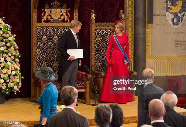 King Willem-Alexander, with Queen Maxima of the Netherlands, delivers an address to the government on budget day in the Hall of Knights, on September...