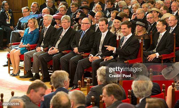 Prime Minister of the Netherlands, Mark Rutte, sits with government ministers as King Willem-Alexander delivers an address on budget day in the Hall...