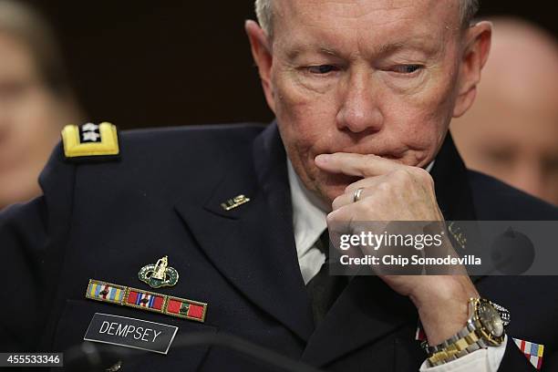 Chairman of the Joint Chiefs of Staff Army Gen. Martin Dempsey testifies before the Senate Armed Services Committee in the Hart Senate Office...