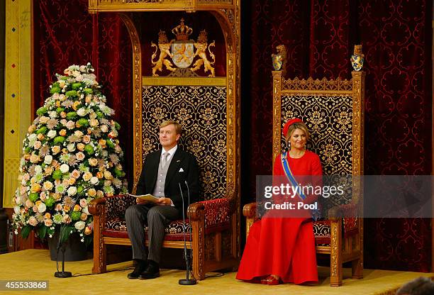 King Willem-Alexander, with Queen Maxima of the Netherlands, delivers an address to the government on budget day in the Hall of Knights, on September...