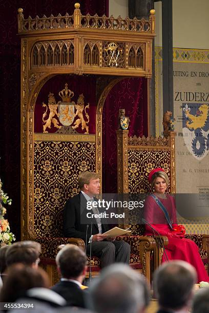 King Willem-Alexander, with Queen Maxima of the Netherlands, delivers an address to the government on budget day in the Hall of Knights, on September...