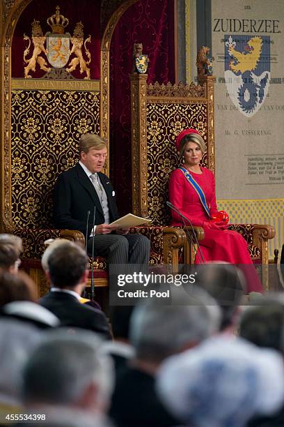 King Willem-Alexander, with Queen Maxima of the Netherlands, delivers an address to the government on budget day in the Hall of Knights, on September...