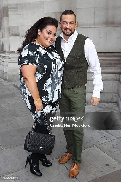 Lisa Riley and Robin Windsor arrive for the Evans show on September 16, 2014 in London, England.