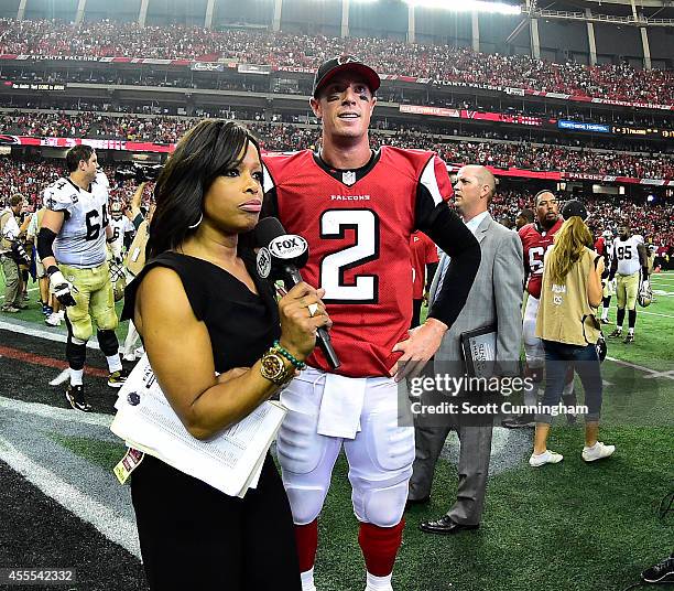 Matt Ryan of the Atlanta Falcons is interviewed by Pam Oliver after the game against the New Orleans Saints at the Georgia Dome on September 7, 2014...