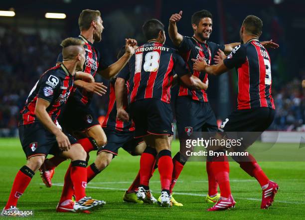 Andrew Surman of AFC Bournemouth celebrates with his team scoring the opening goal during the Sky Bet Championship match between AFC Bournemouth and...