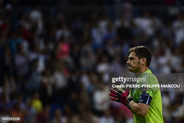 Real Madrid's goalkeeper Iker Casillas gestures during the UEFA Champions League football match Real Madrid CF vs FC Basel 1893 at the Santiago...