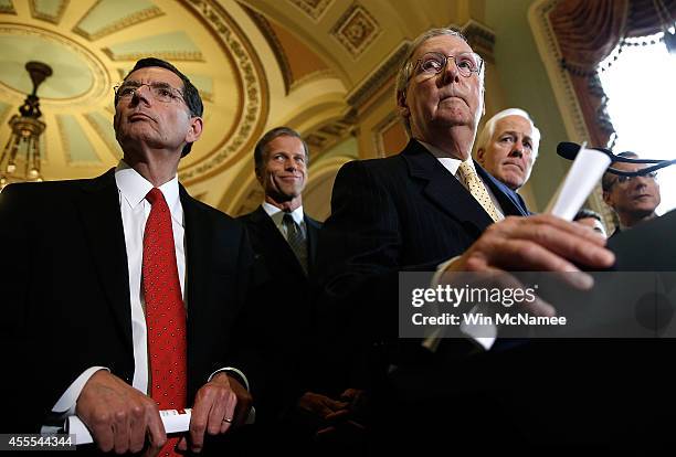 Senate Minority Leader Mitch McConnell answers questions with Republican leaders following the weekly Republican policy luncheon at the U.S. Capitol...
