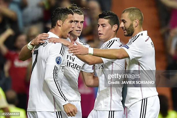 Real Madrid's Portuguese forward Cristiano Ronaldo , Real Madrid's Welsh forward Gareth Bale , Real Madrid's French forward Karim Benzema and Real...