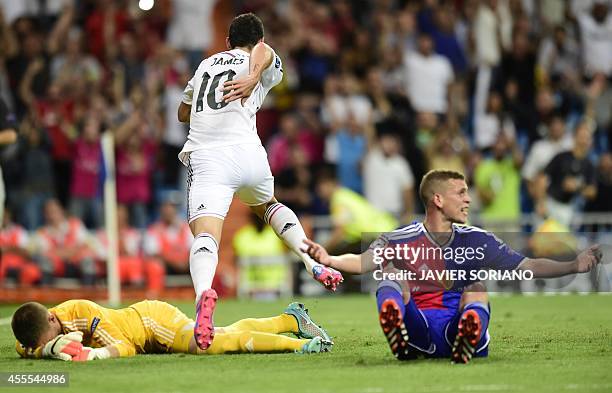 Real Madrid's Colombian midfielder James Rodriguez celebrates after scoring their fourth goal during the UEFA Champions League football match Real...