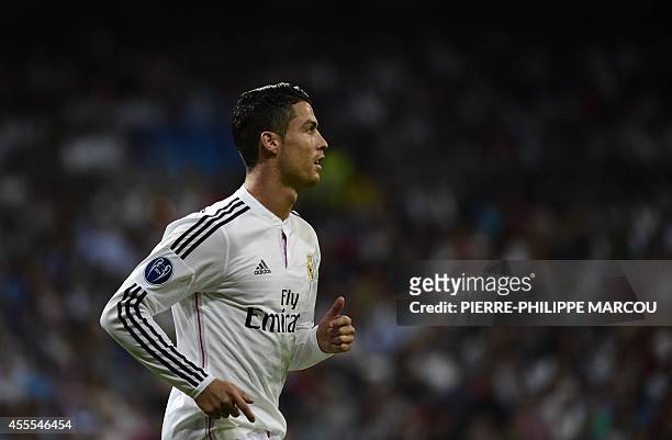 Real Madrid's Portuguese forward Cristiano Ronaldo gestures during the UEFA Champions League football match Real Madrid CF vs FC Basel 1893 at the...