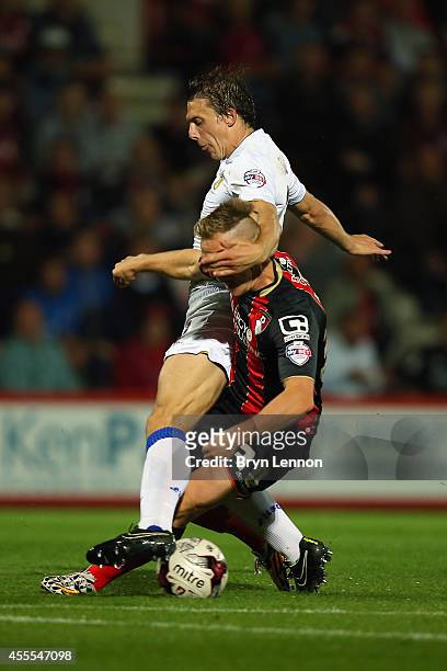 Matt Ritchie of AFC Bournemouth battles with Stephen Warnock of Leeds United during the Sky Bet Championship match between AFC Bournemouth and Leeds...