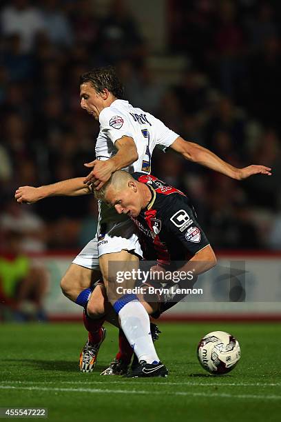 Matt Ritchie of AFC Bournemouth battles with Stephen Warnock of Leeds United during the Sky Bet Championship match between AFC Bournemouth and Leeds...