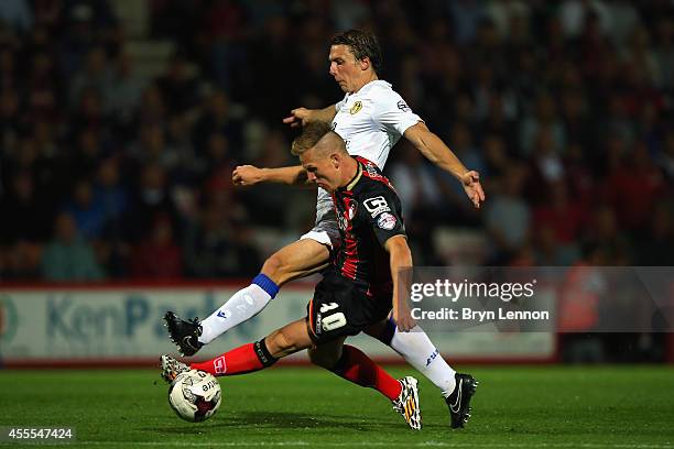 Matt Ritchie of AFC Bournemouth battles with Stephen Warnock of Leeds United during the Sky Bet Championship match between AFC Bournemouth and Leeds...