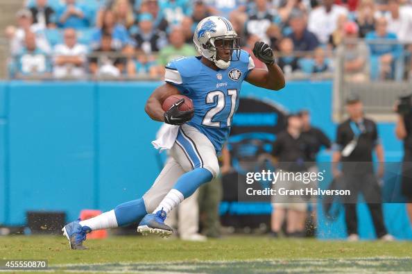 Reggie Bush of the Detroit Lions runs against the Carolina Panthers