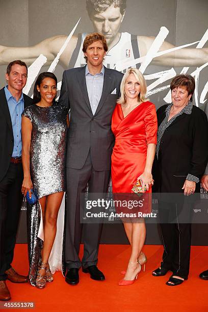 Roland Mayer, Jessica Nowitzki with Dirk Nowitzki, sister Silke Nowitzki and mother Helga Nowitzki attend the premiere of the film 'Nowitzki. Der...