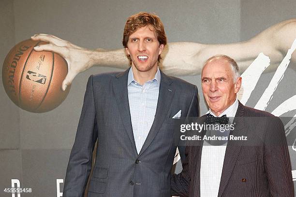 Dirk Nowitzki and Holger Geschwindner attends the premiere of the film 'Nowitzki. Der Perfekte Wurf' at Cinedom on September 16, 2014 in Cologne,...