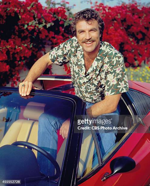 Actor Tom Selleck stars as Thomas Sullivan Magnum on the CBS television series "Magnum, P.I." He is in a red Ferrari 308 and wearing a Hawaiian...