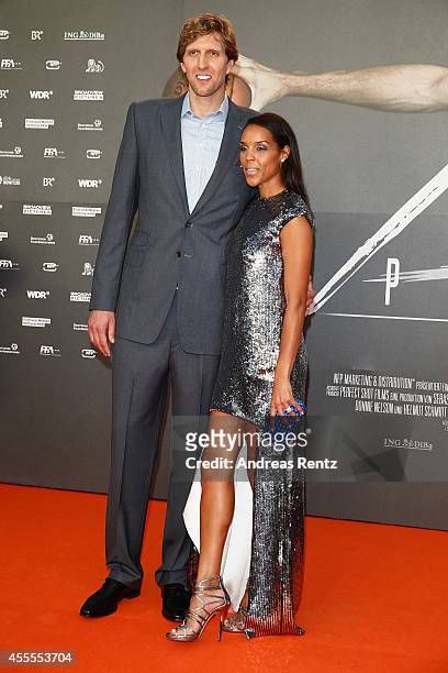 Dirk Nowitzki and his wife Jessica Nowitzki attend the premiere of the film 'Nowitzki. Der Perfekte Wurf' at Cinedom on September 16, 2014 in...