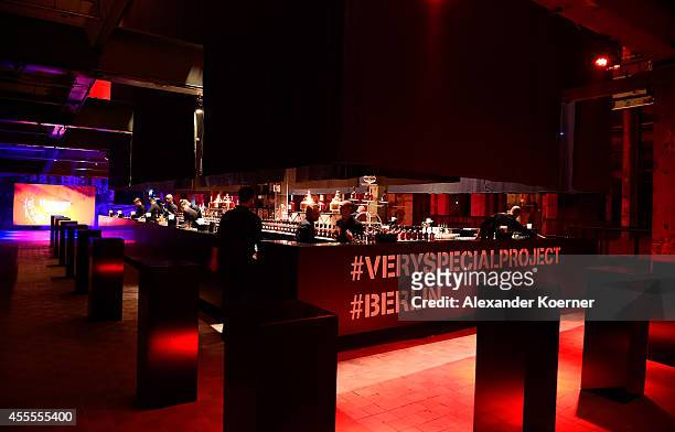 Bartenders work at the Hennessy Very Special Limited Edition by Shepard Fairey launch party at Kraftwerk Mitte on September 16, 2014 in Berlin,...
