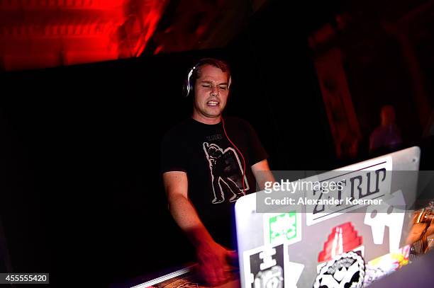 Shepard Fairey DJs at the Hennessy Very Special Limited Edition by Shepard Fairey launch party at Kraftwerk Mitte on September 16, 2014 in Berlin,...