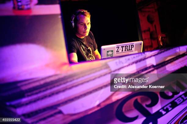 Shepard Fairey DJs during the Hennessy Very Special Limited Edition by Shepard Fairey launch party at Kraftwerk Mitte on September 16, 2014 in...