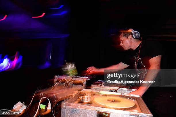 Shepard Fairey DJs during the Hennessy Very Special Limited Edition by Shepard Fairey launch party at Kraftwerk Mitte on September 16, 2014 in...