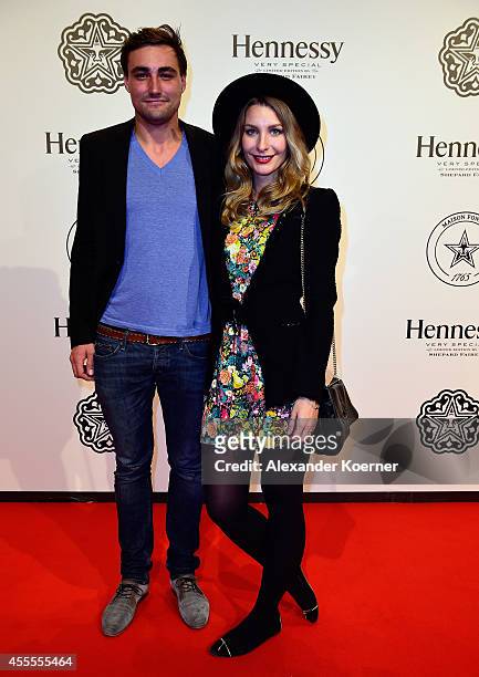 Sebastian Sielmann and Elsa Schonboyer attend the Hennessy Very Special Limited Edition by Shepard Fairey launch party at Kraftwerk Mitte on...