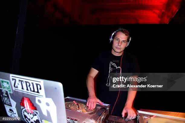 Shepard Fairey DJs during the Hennessy Very Special Limited Edition by Shepard Fairey launch party at Kraftwerk Mitte on September 16, 2014 in...