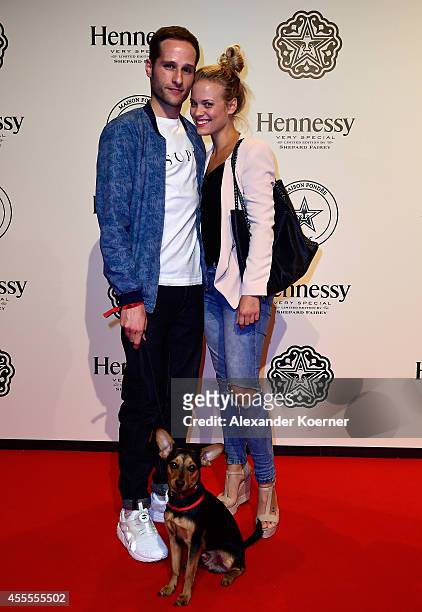 Lee Rychter , Leonie Jung and the dog Louie attend the Hennessy Very Special Limited Edition by Shepard Fairey launch party at Kraftwerk Mitte on...