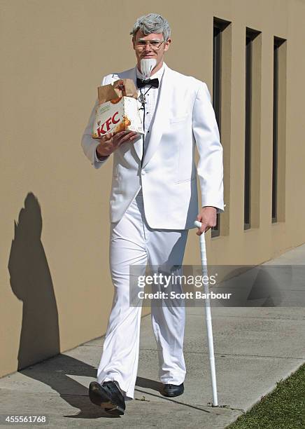 James Toohey of the Cats arrives dressed as Colonel Harland David Sanders at the Geelong Cats AFL post season celebrations at Lord of The Isles Hotel...