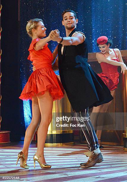 Aurore Delplace and Golan Yosef perform during the 'Love Circus' Press Preview At the Folies Bergeres on September on September 16, 2014 in Paris,...