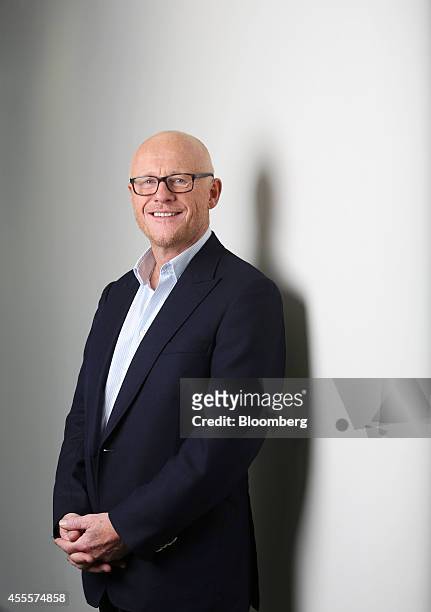 John Caudwell, billionaire and founder of Phones 4u Ltd., poses for a photograph following a Bloomberg Television interview in London, U.K., on...