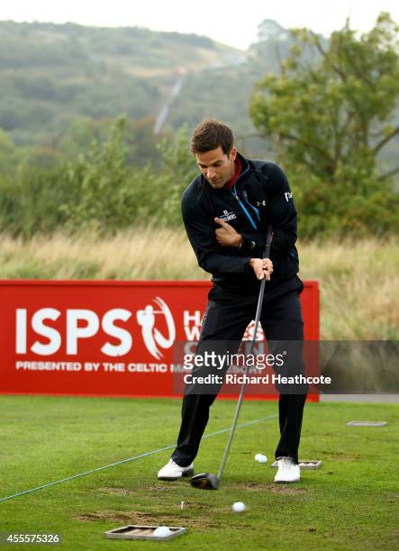 Presenter Gethin Jones takes part in a Blind & Disabled Golf Clinic before the Pro-Am for the ISPS Handa Wales Open at Celtic Manor Resort on...