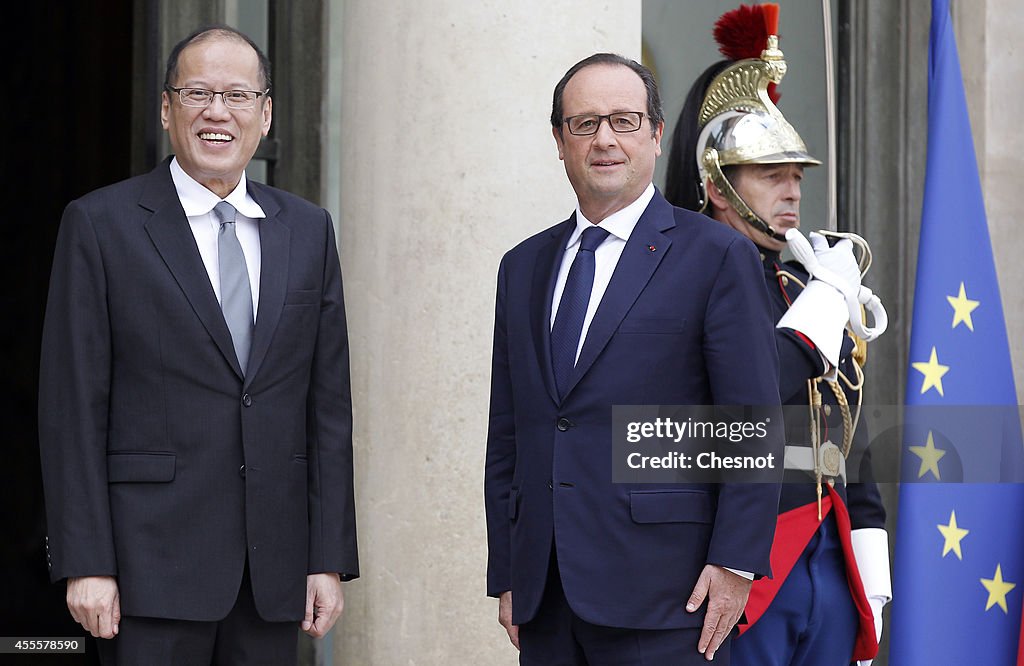French President Francois Hollande Receives Benigno Aquino At Elysee Palace in Paris