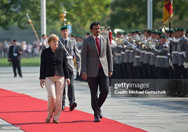 German Chancellor Angela Merkel and Sheikh Tamim bin Hamad Al Thani, the eighth and current Emir of the State of Qatar meet in chancellery on...