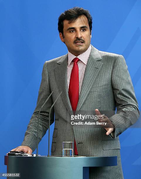 Sheikh Tamim bin Hamad Al Thani, the eighth and current Emir of the State of Qatar, speaks at a press conference with German Chancellor Angela Merkel...