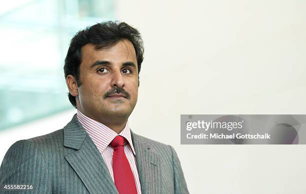 German Chancellor Angela Merkel and Sheikh Tamim bin Hamad Al Thani, the eighth and current Emir of the State of Qatar meet in chancellery on...