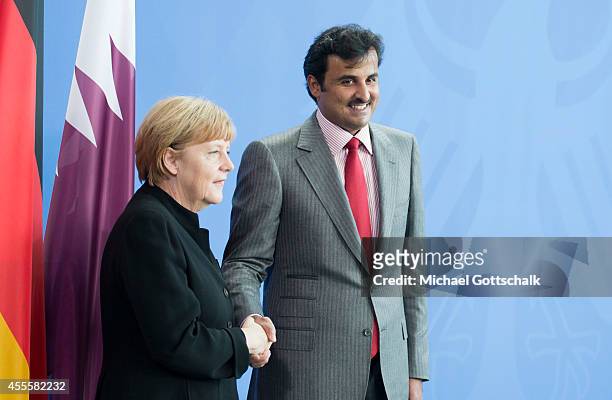 German Chancellor Angela Merkel and Sheikh Tamim bin Hamad Al Thani, the eighth and current Emir of the State of Qatar meet in chancellery on...