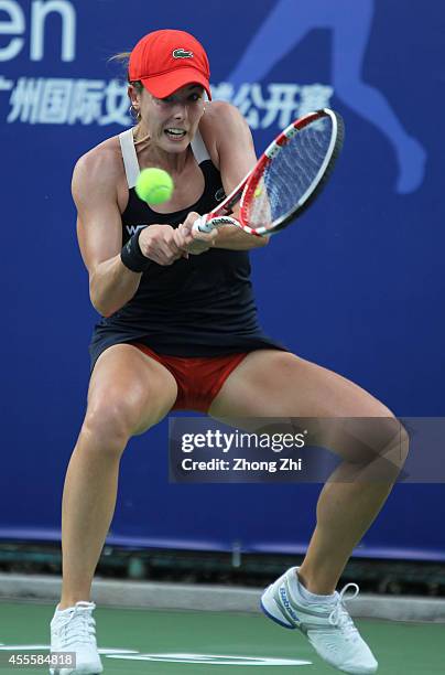 Alize Cornet of France returns a shot during her match against Shahar Peer of Israel during day three of the 2014 WTA Guangzhou Open at Tianhe Sports...