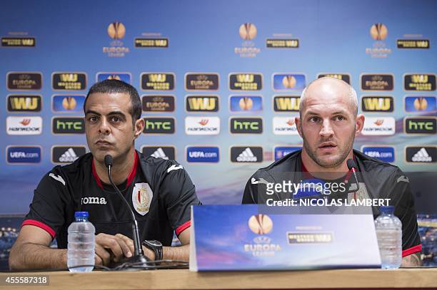 Standard de Liege's head coach Guy Luzon and Standard's Jelle Van Damme give a press conference on September 17, 2014 in Liege, ahead of tomorrow's...