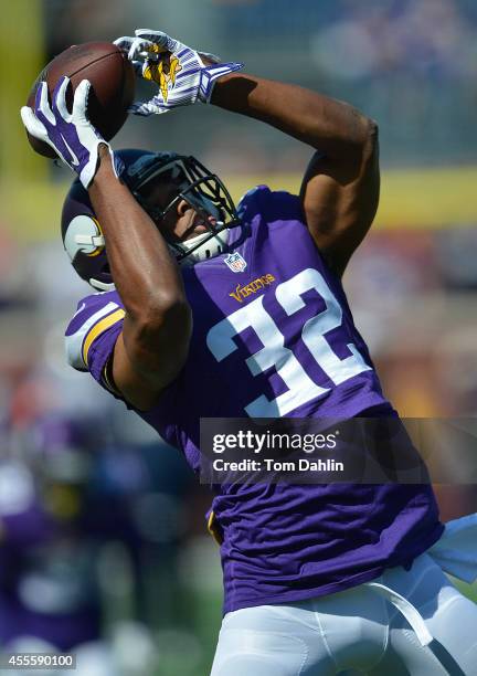 Antone Exum of the Minnesota Vikings catches the ball during warmups prior to an NFL game against the New England Patriots at TCF Bank Stadium, on...