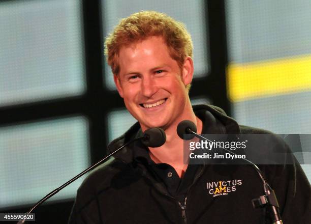 Prince Harry speaks on stage at the Invictus Games Closing Concert at Queen Elizabeth Olympic Park on September 14, 2014 in London, United Kingdom.