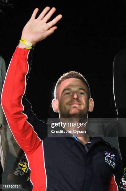 Joe Townsend of Great Britain salutes the crowd after receiving the Jaguar Award for Exceptional Performance during the Invictus Games Closing...