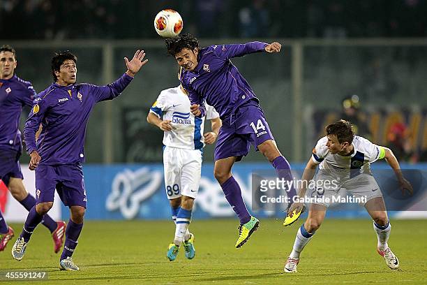 Matias Fernandez of ACF Fiorentina fights for the ball with Ruslan Rotan of FC Dnipro Dnipropetrovsk during the UEFA Europa League Group E match...