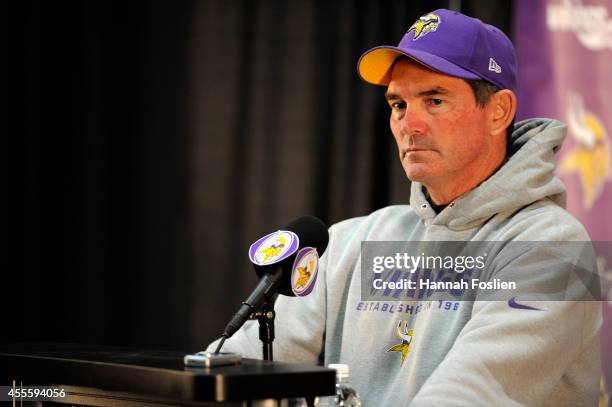 Head Coach Mike Zimmer of the Minnesota Vikings speaks to the media during a press conference on September 17, 2014 at Winter Park in Eden Prairie,...