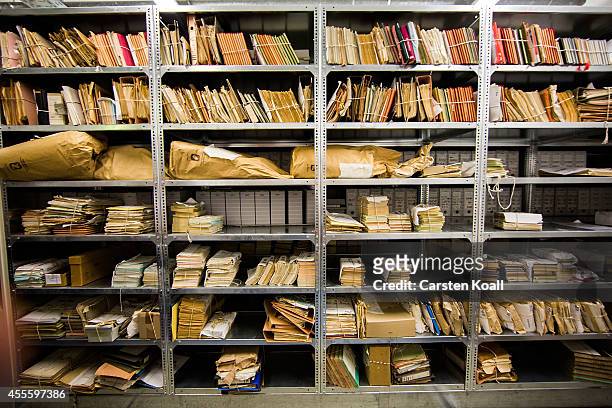 View of hundreds of files lining the shelves in the archives of the former East German secret police, known as the Stasi on September 16, 2014 in...