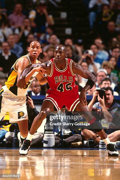 Michael Jordan of the Chicago Bulls battles for position against the Indiana Pacers on March 19, 1995 at Market Square Arena in Indianapolis,...